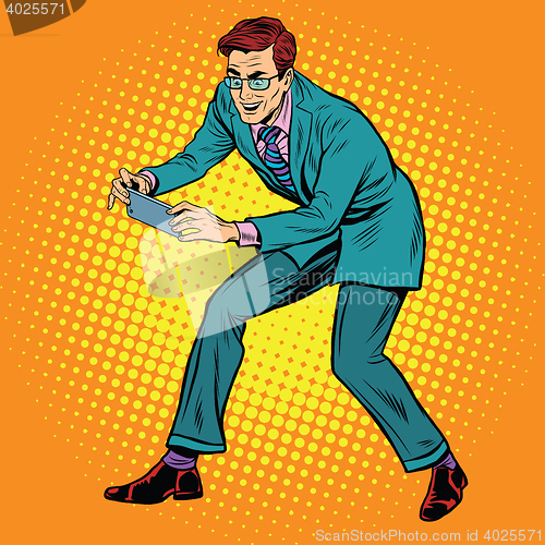 Image of Man photographed on a smartphone