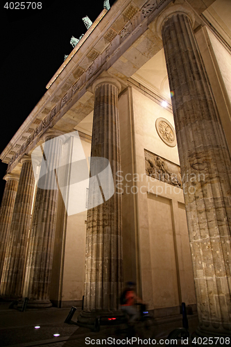 Image of Brandenburg gate at night in Berlin, Germany