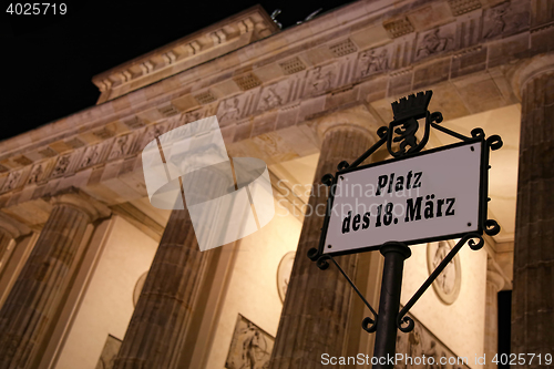 Image of Brandenburg gate at night in Berlin, Germany