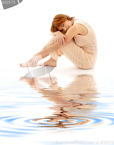 Image of relaxed lady on white sand