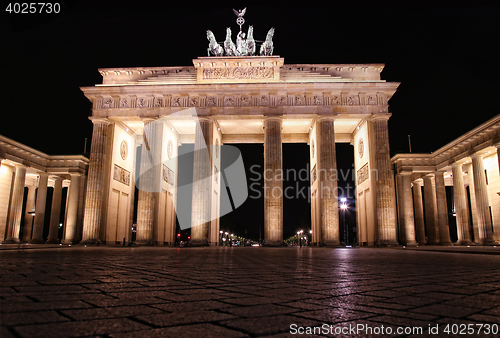 Image of Brandenburg gate at night in Berlin, Germany