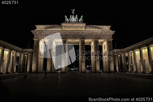Image of Brandenburg gate at night in Berlin, Germany