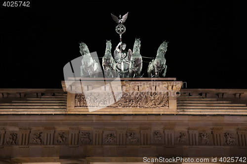 Image of Brandenburg gate at night in Berlin, Germany