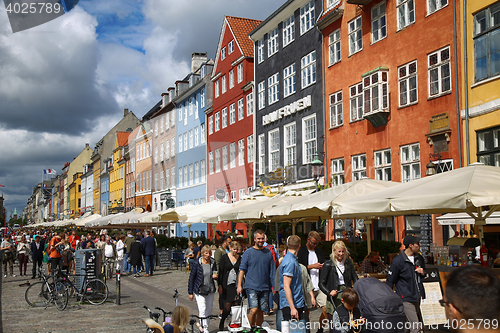Image of COPENHAGEN, DENMARK - AUGUST 14, 2016: Boats in the docks Nyhavn