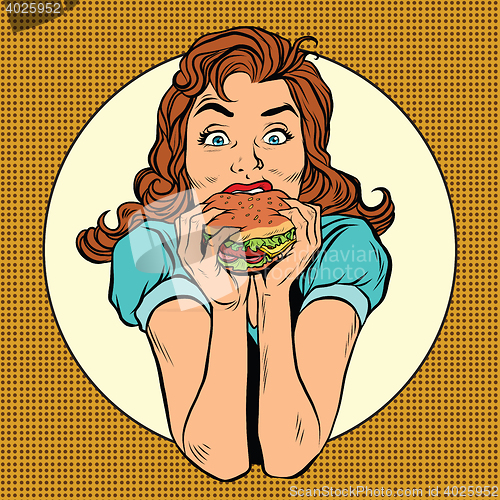 Image of Young woman eating Burger