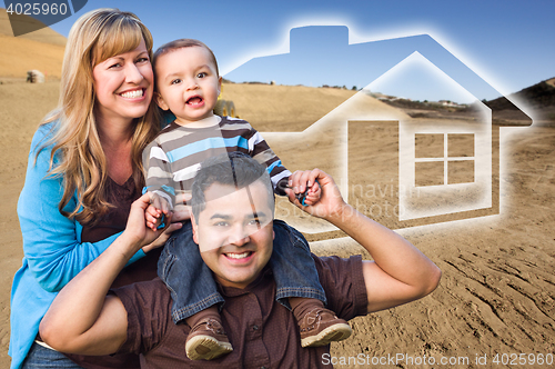 Image of Mixed Race Family at Construction Site with Ghoosted House Behin