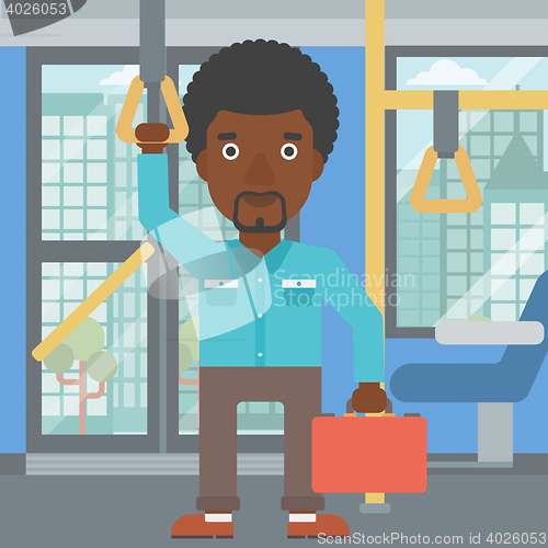 Image of Man traveling by public transport.