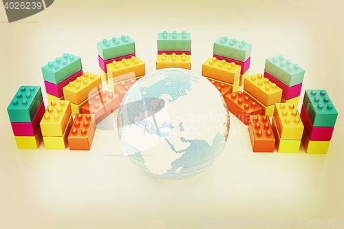 Image of Building blocks efficiency concept on white. Globall with earth.