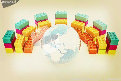 Image of Building blocks efficiency concept on white. Globall with earth.