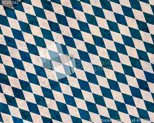 Image of Flag on rusty metal