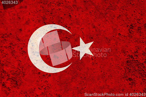 Image of Flag on rusty metal