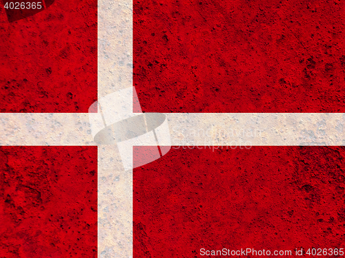 Image of Flag on rusty metal