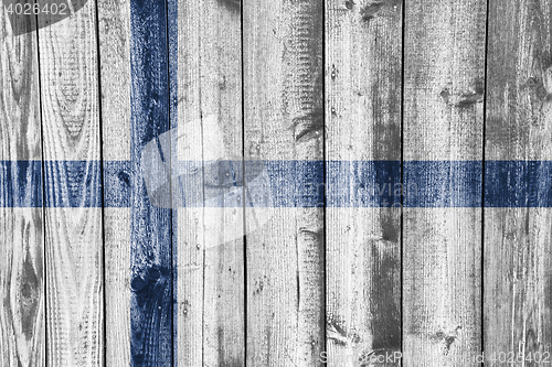 Image of Flag on weathered wood