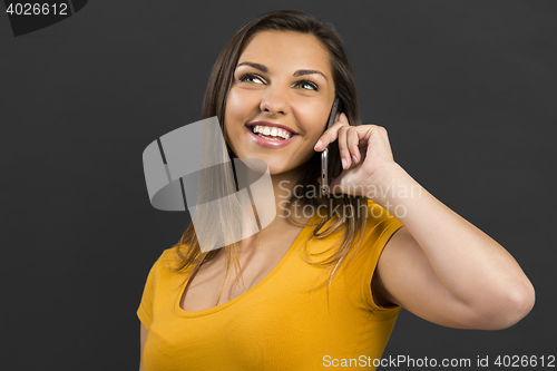 Image of Woman talking at phone