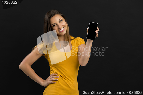 Image of Beautiful girl with a smartphone