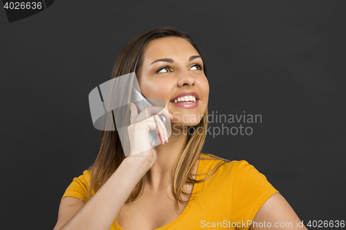 Image of Woman talking at phone