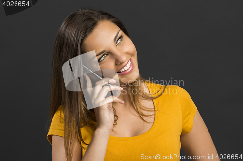 Image of Woman talking at phone