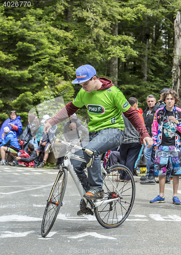 Image of Acrobat Amateur Cyclist - Tour de Freance 2014