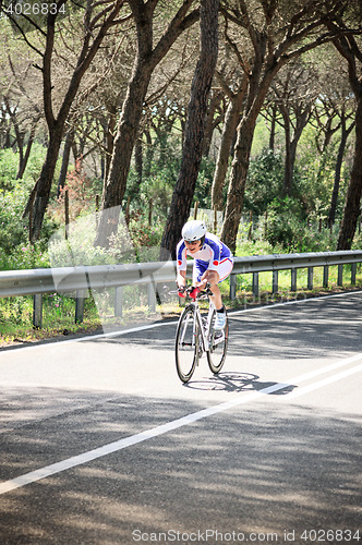 Image of Grosseto, Italy - May 09, 2014: The cyclist without feet with the bike during the sporting event