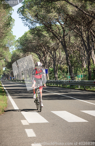 Image of Grosseto, Italy - May 09, 2014: The disabled cyclist with the bike during the sporting event