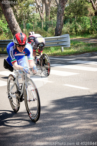 Image of Grosseto, Italy - May 09, 2014: The cyclist without feet with the bike during the sporting event