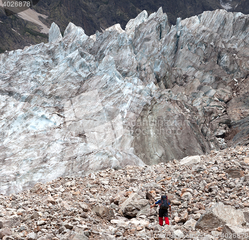 Image of Hiker on glacier moraine