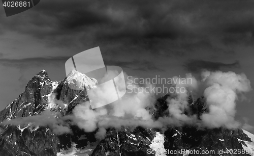 Image of Black and white view on Mt. Ushba in clouds