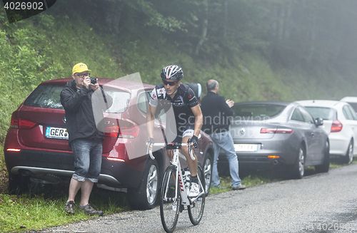 Image of The Cyclist Matthew Busche Climbing Col du Platzerwasel - Tour d