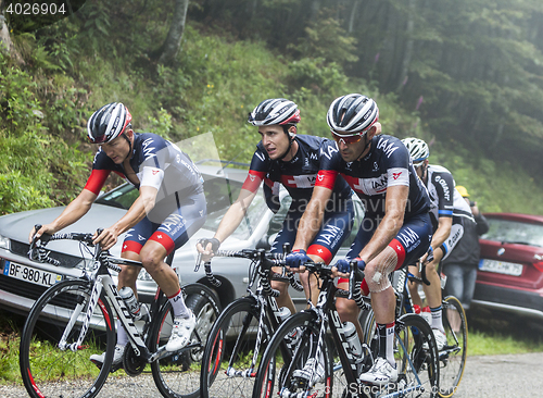 Image of Group of Three Cyclists - Tour de France 2014