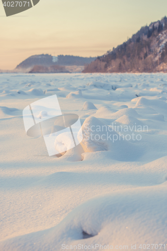 Image of landscape. weather, snowdrifts in the foreground