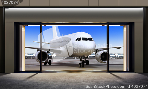 Image of plane expects tourists at airport 