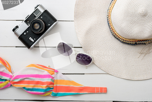 Image of Beach accessories on wooden board