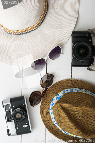 Image of Beach accessories on wooden board