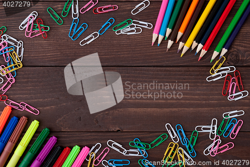 Image of School supplies on a wooden table