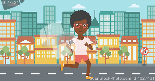 Image of Woman running with earphones and smartphone.