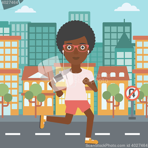 Image of Woman running with earphones and smartphone.