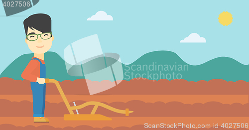 Image of Farmer on the field with plough.