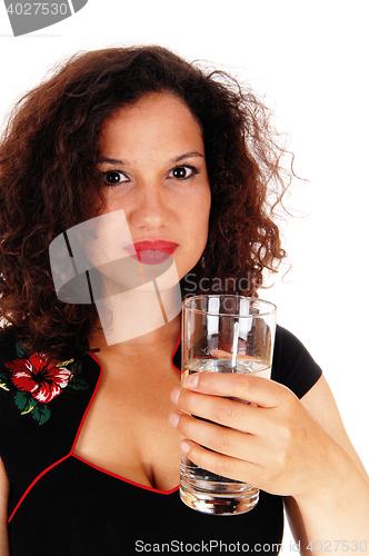 Image of Beautiful woman holding glass water.