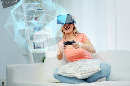 Image of woman in virtual reality headset with controller