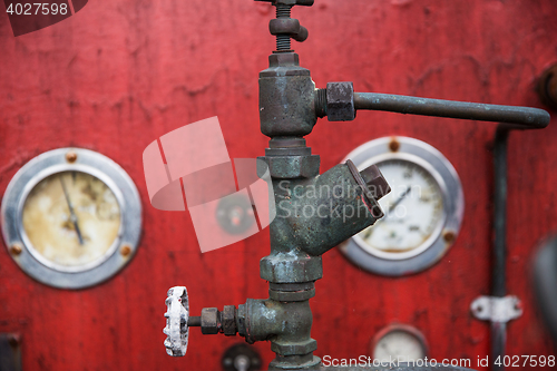Image of close up of vintage valve mechanism at factory