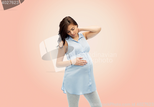 Image of pregnant woman with neckache