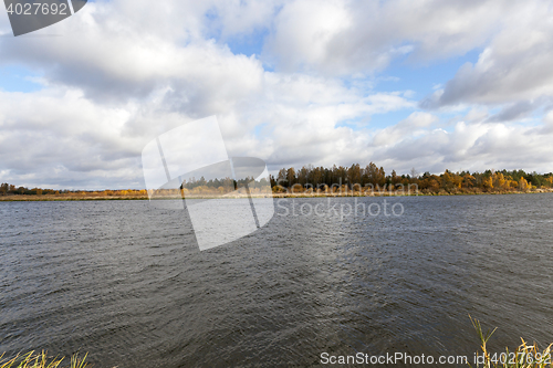 Image of the river and the forest, autumn