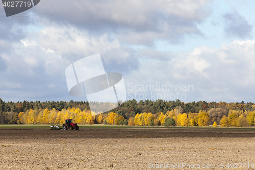 Image of tractor in a field