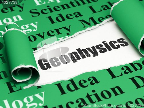 Image of Science concept: black text Geophysics under the piece of  torn paper
