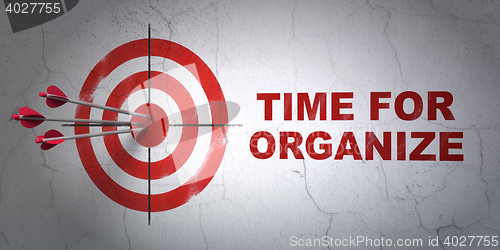 Image of Time concept: target and Time For Organize on wall background