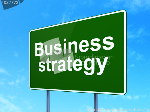 Image of Finance concept: Business Strategy on road sign background