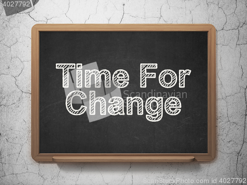 Image of Time concept: Time For Change on chalkboard background