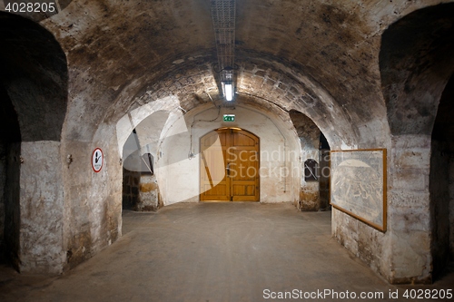 Image of Long underground brick tunnel in the wine cellar