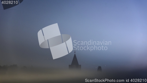 Image of Church tower in fog