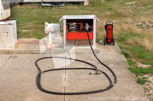 Image of Gasoline nozzle and hose